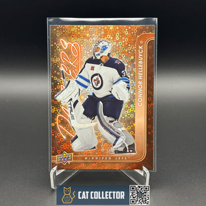 2024-25 UD Series 1 CONNOR HELLEBUYCK #DZ-48 Dazzlers Orange - Winnipeg Jets